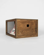 Side-open wooden sneaker box, showcasing sneaker storage inside.